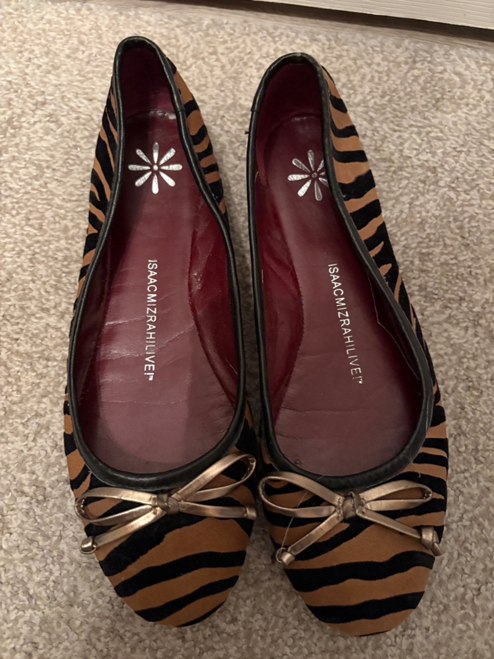 Isaac Mizrahi Black and Brown Zebra-Print Ballet Flats with Gold Bow
